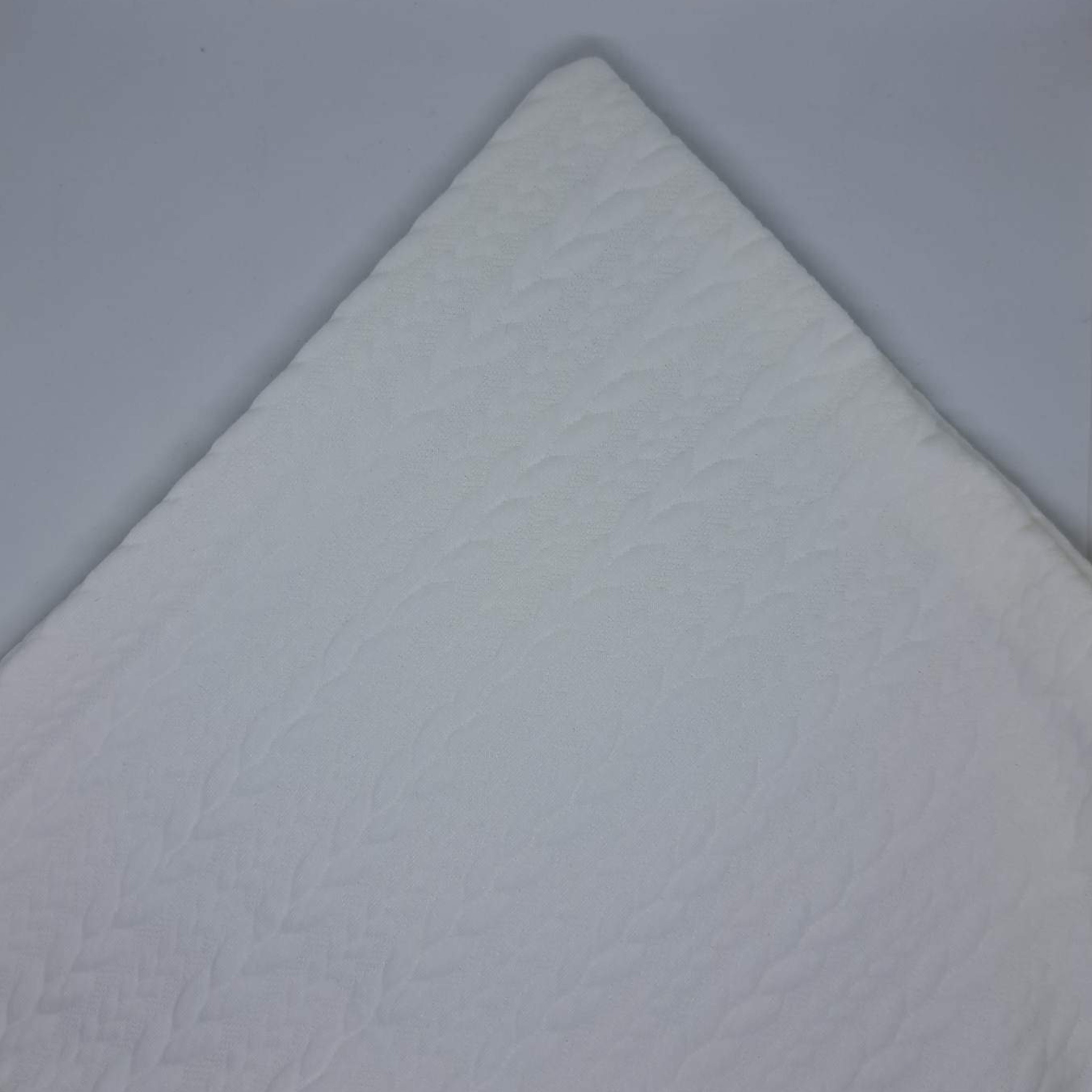 Coussin blanc à torsades