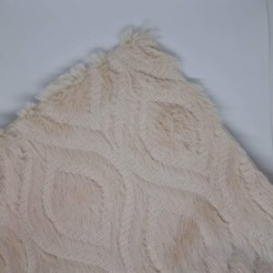 Coussin beige tissé motifs texturés