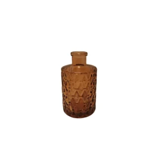 Soliflore en verre ambré, disponible à la location pour une décoration de mariage moderne et élégante.